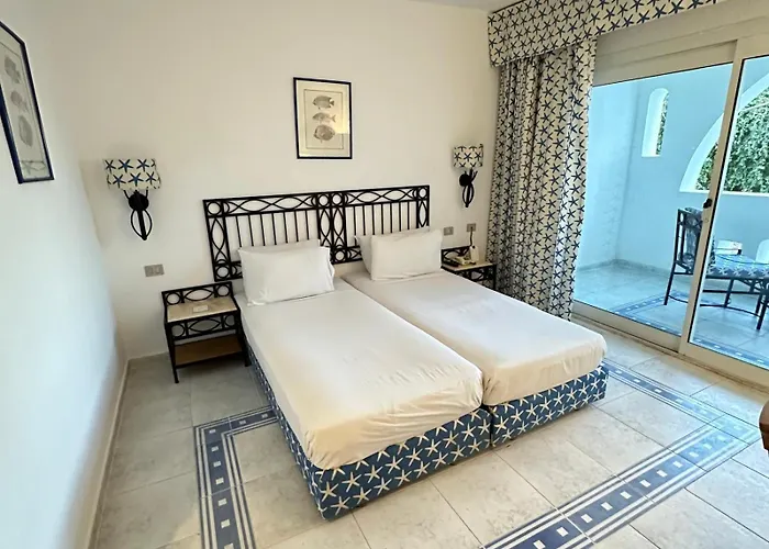 Suite privata al Domina club resort Acquamarine, Coral Bay, spa e casinó.