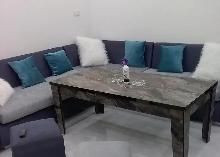 A Two-Bedroom Apartment With A Living Room